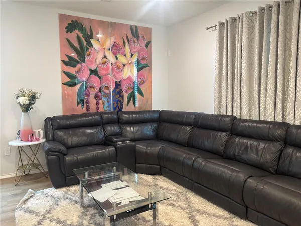 a living room with furniture and a couch