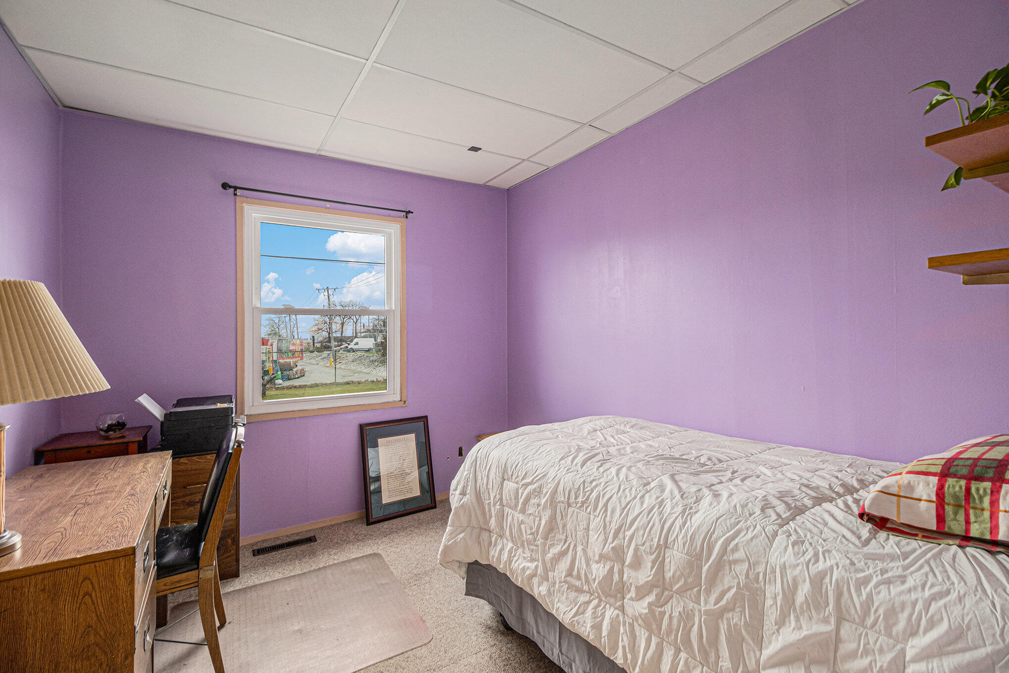 217 Crestview Lane Crown Point, IN 46307 - Photo 11 of 14 a bedroom with a bed and a desk