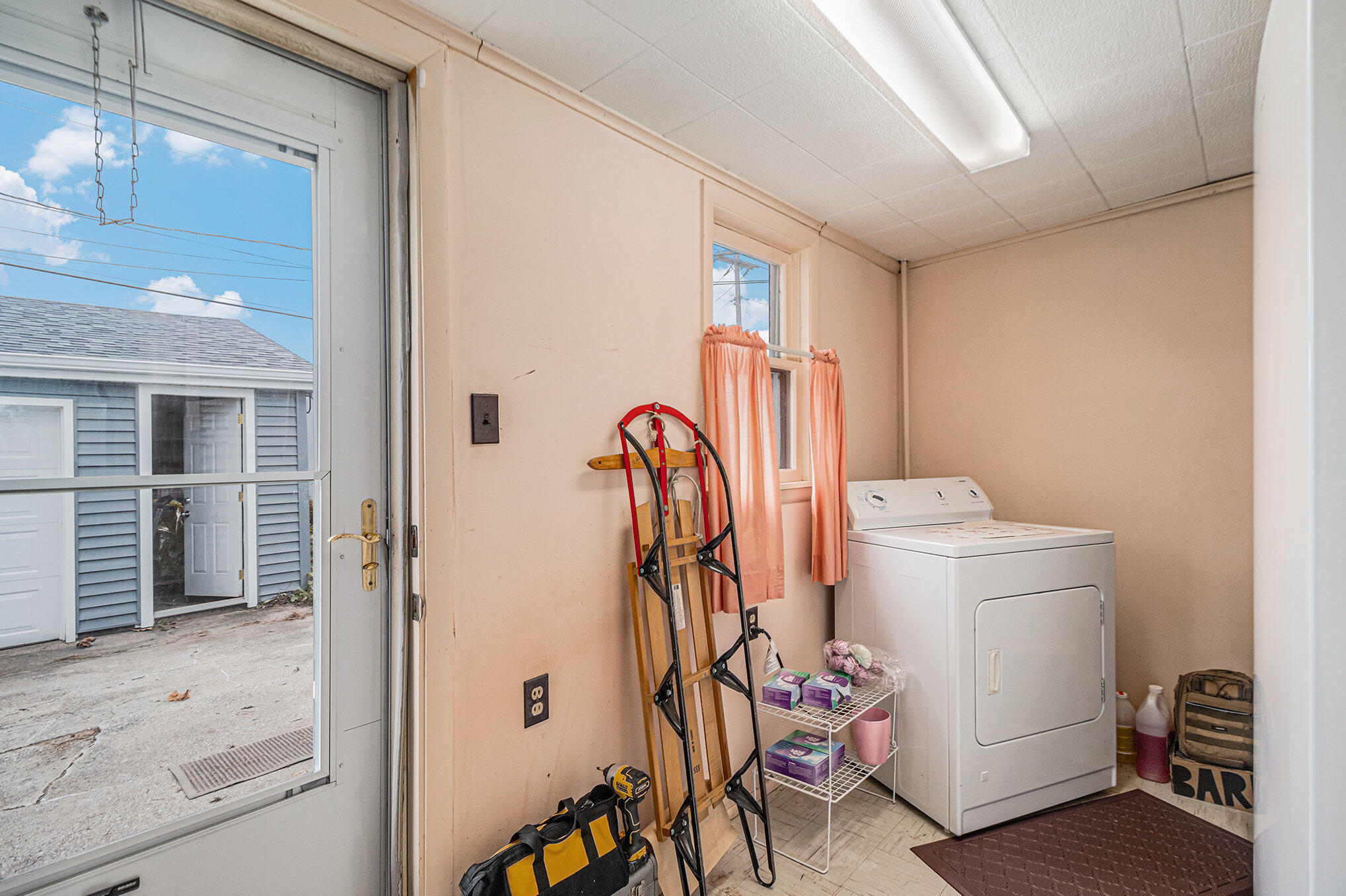217 Crestview Lane Crown Point, IN 46307 - Photo 13 of 14 a view of a storage & utility room with dryer and washer