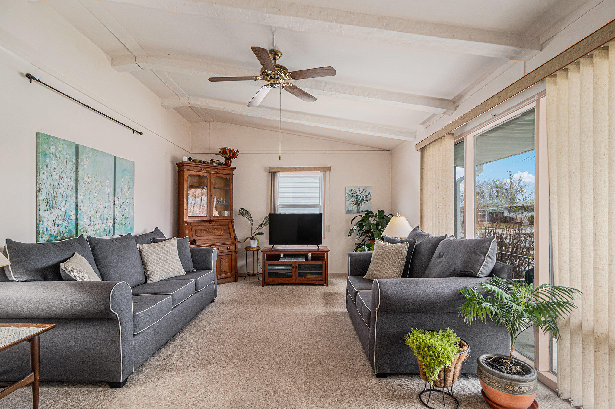217 Crestview Lane Crown Point, IN 46307 - Photo 4 of 14 a living room with furniture and a flat screen tv