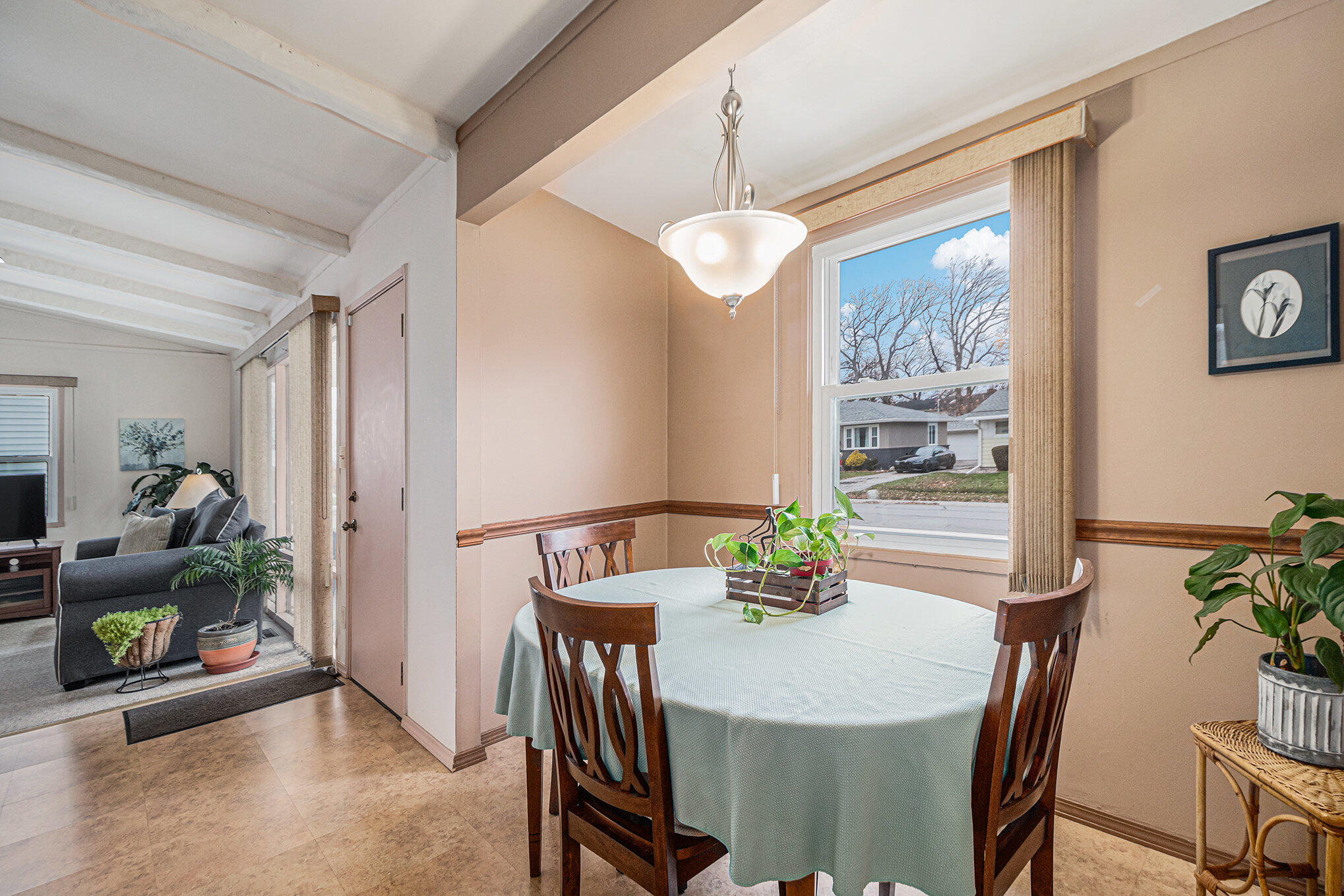217 Crestview Lane Crown Point, IN 46307 - Photo 6 of 14 a view of a dining room with furniture window and wooden floor