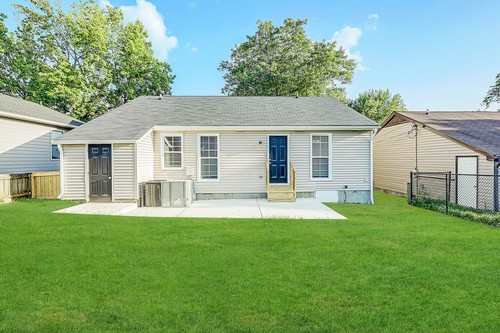 879 Heritage Circle Madison, TN 37115 - Photo 14 of 27 a house that is sitting in the grass