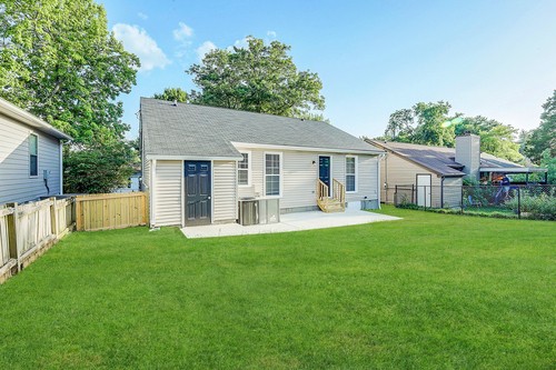 879 Heritage Circle Madison, TN 37115 - Photo 15 of 27 a view of a house with backyard and porch