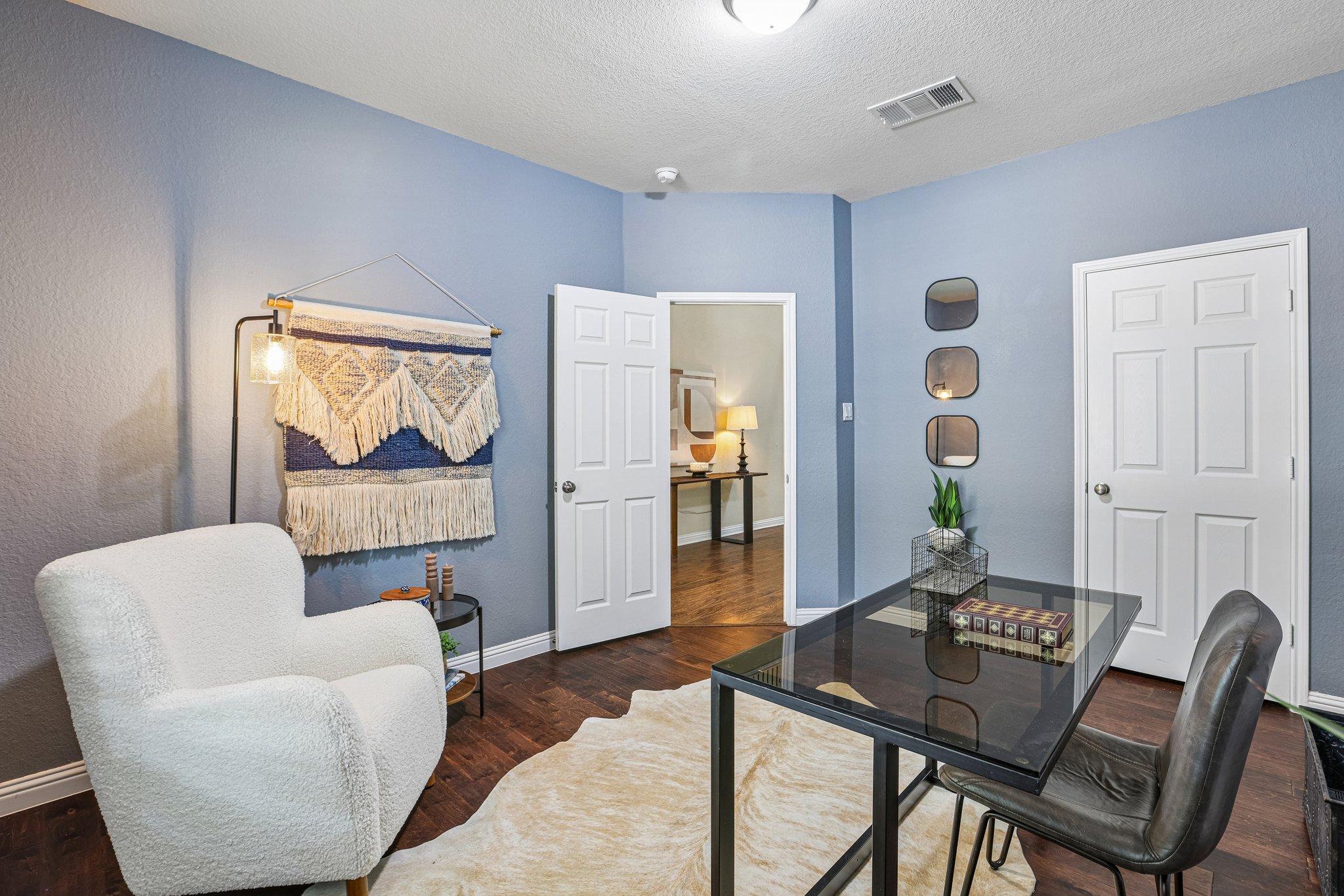 1924 Granite Springs Road Leander, TX 78641 - Photo 21 of 36 Guest Bedroom #1 located on the first floor. Staged as an office, however it has a closet and a full bathroom next door.