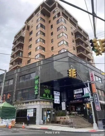 a view of a building with a street