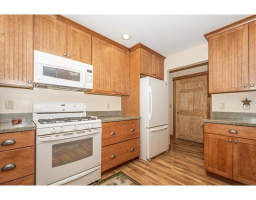 389 Turnpike Road Ashby, MA 01431 - Photo 12 of 30 a kitchen with cabinets appliances and a window