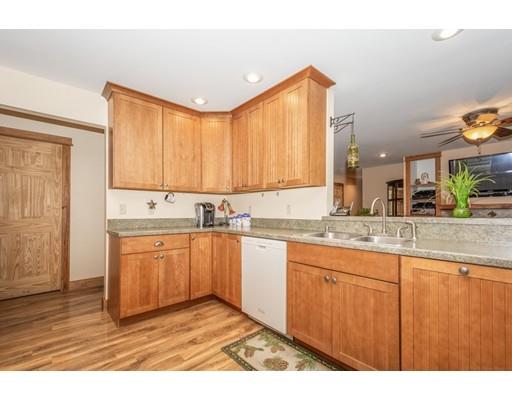 389 Turnpike Road Ashby, MA 01431 - Photo 13 of 30 a view of a kitchen with granite countertop cabinets and a sink