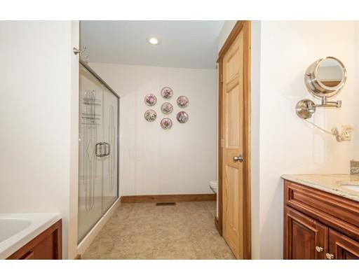 389 Turnpike Road Ashby, MA 01431 - Photo 17 of 30 a bathroom with a sink and a mirror