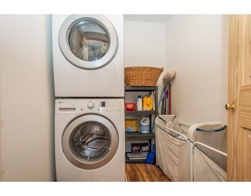 389 Turnpike Road Ashby, MA 01431 - Photo 20 of 30 a view of a bedroom with washer and dryer