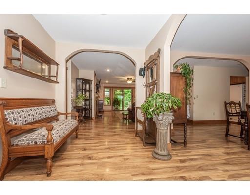 389 Turnpike Road Ashby, MA 01431 - Photo 3 of 30 a living room with furniture flowerpot and wooden floor