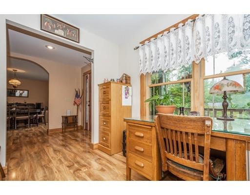 389 Turnpike Road Ashby, MA 01431 - Photo 6 of 30 a view of a living room and entry way