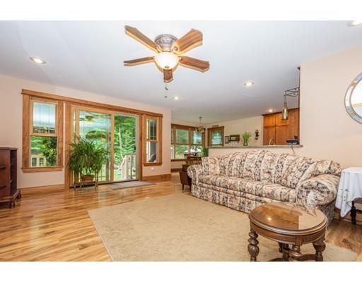 389 Turnpike Road Ashby, MA 01431 - Photo 7 of 30 a living room with a couch and a large window