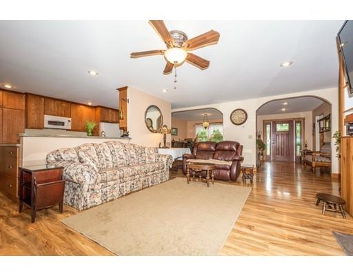 389 Turnpike Road Ashby, MA 01431 - Photo 9 of 30 a living room with furniture and wooden floor