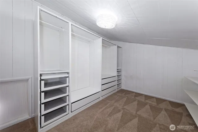 a view of an empty walk in closet