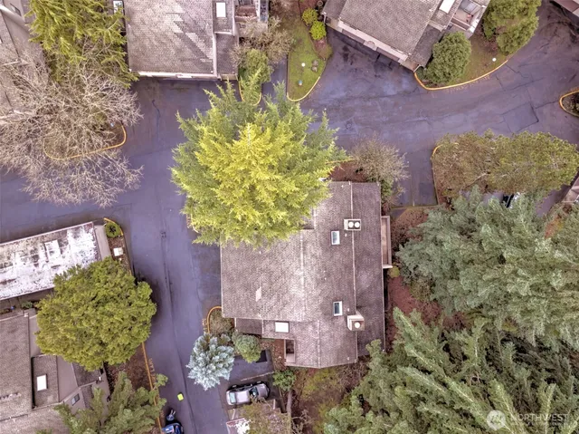 an aerial view of a house a yard and a garden
