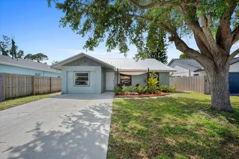 a front view of a house with patio