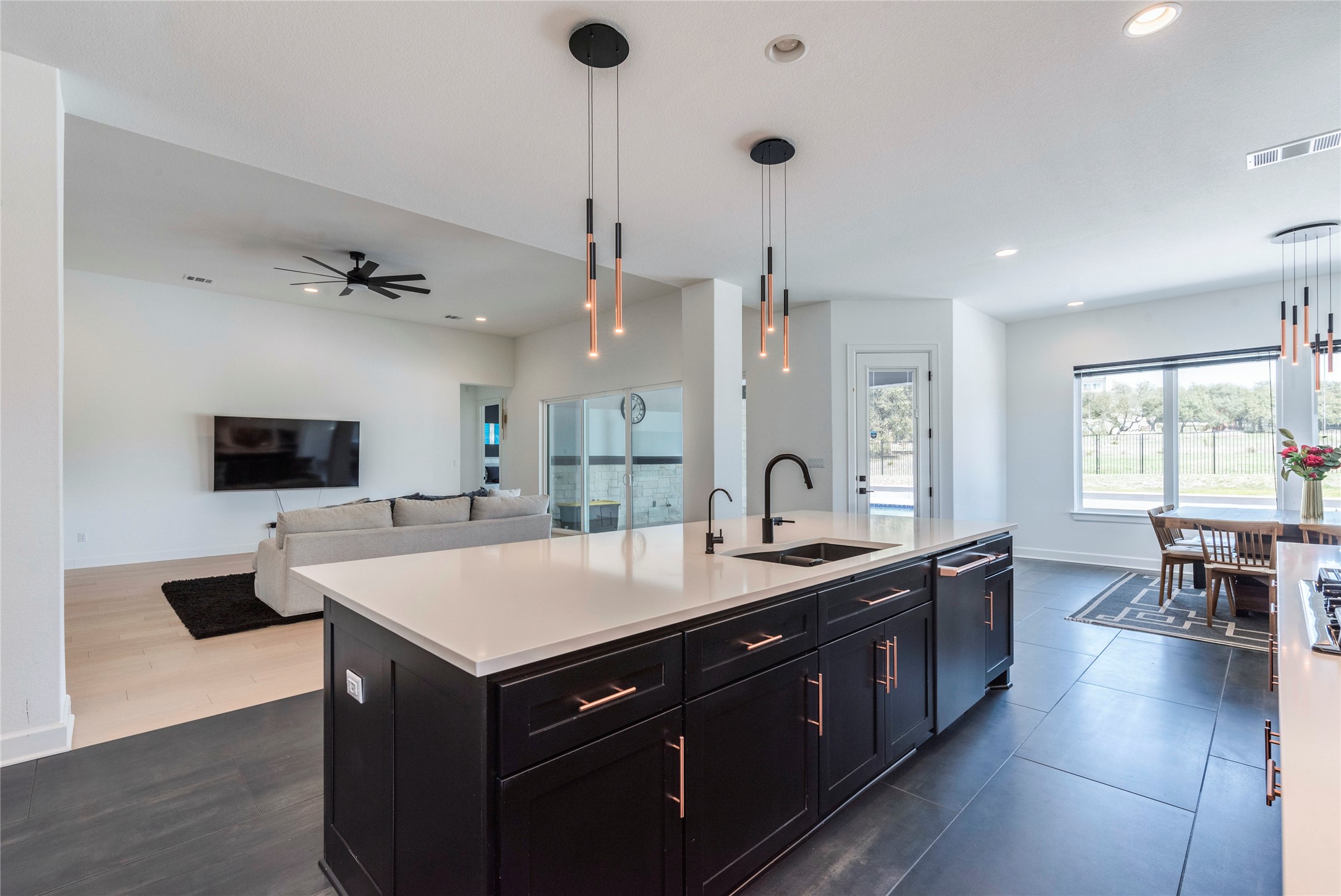 231 Call Drive Austin, TX 78737 - Photo 5 of 40 Large island opens into the living room perfect for entetaining