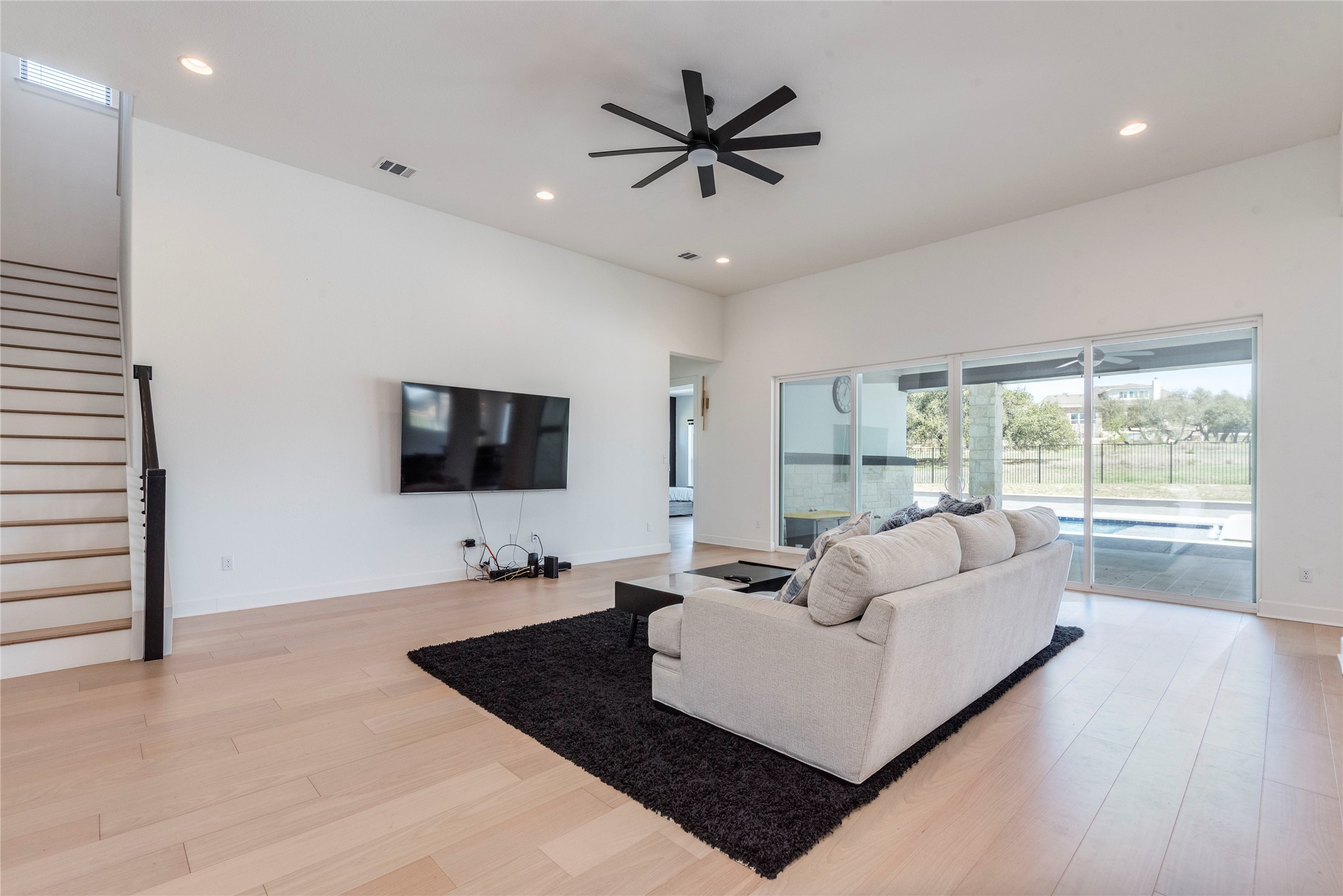 231 Call Drive Austin, TX 78737 - Photo 10 of 40 Oversized sliding glass doors lead to the pool!