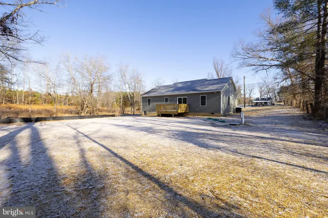 a building with trees in front of it