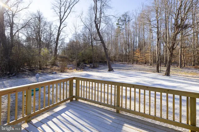 a view of a balcony with trees