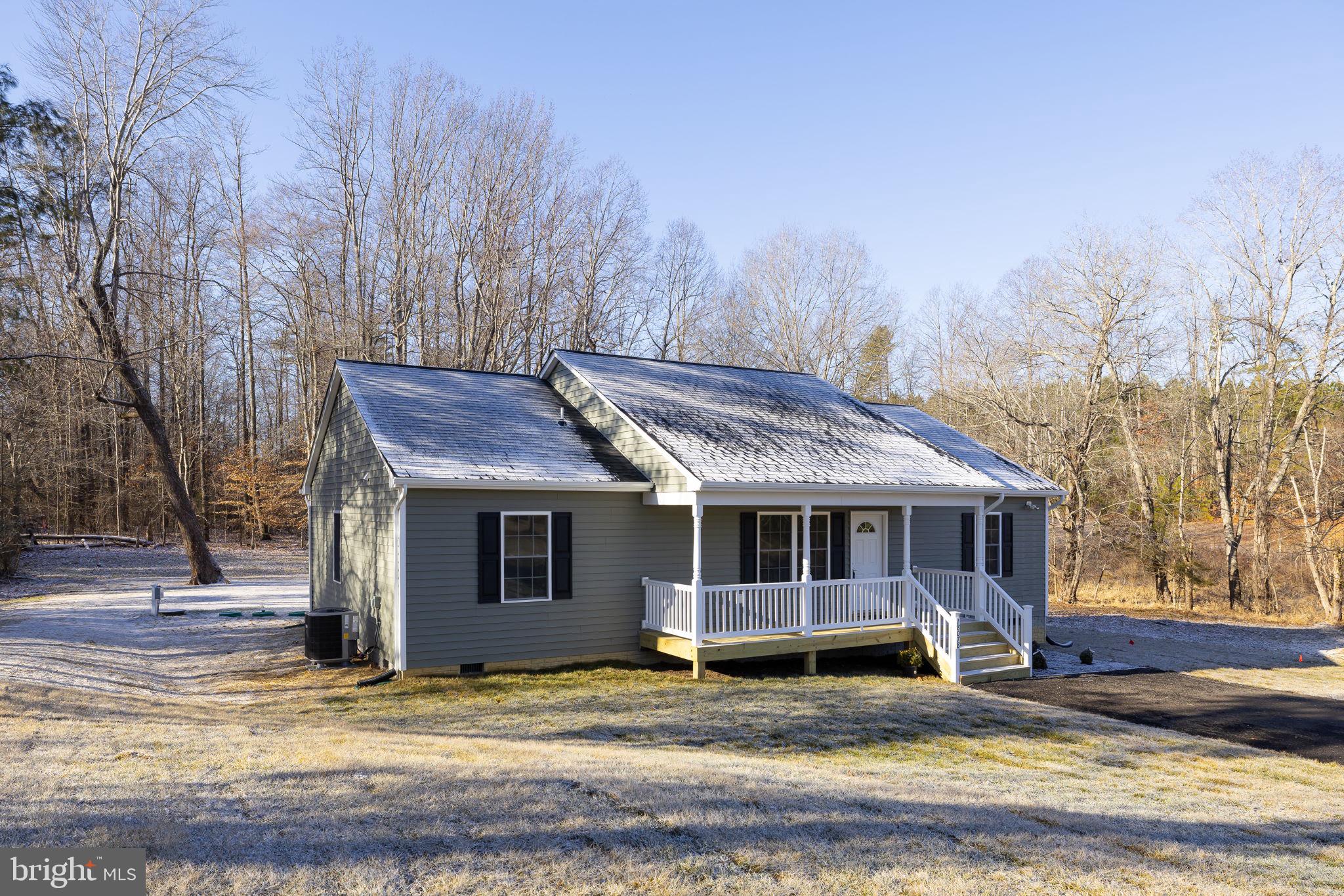 18078 Monrovia Road Orange, VA 22960 - Photo 47 of 49 a view of a house with a small yard and large trees