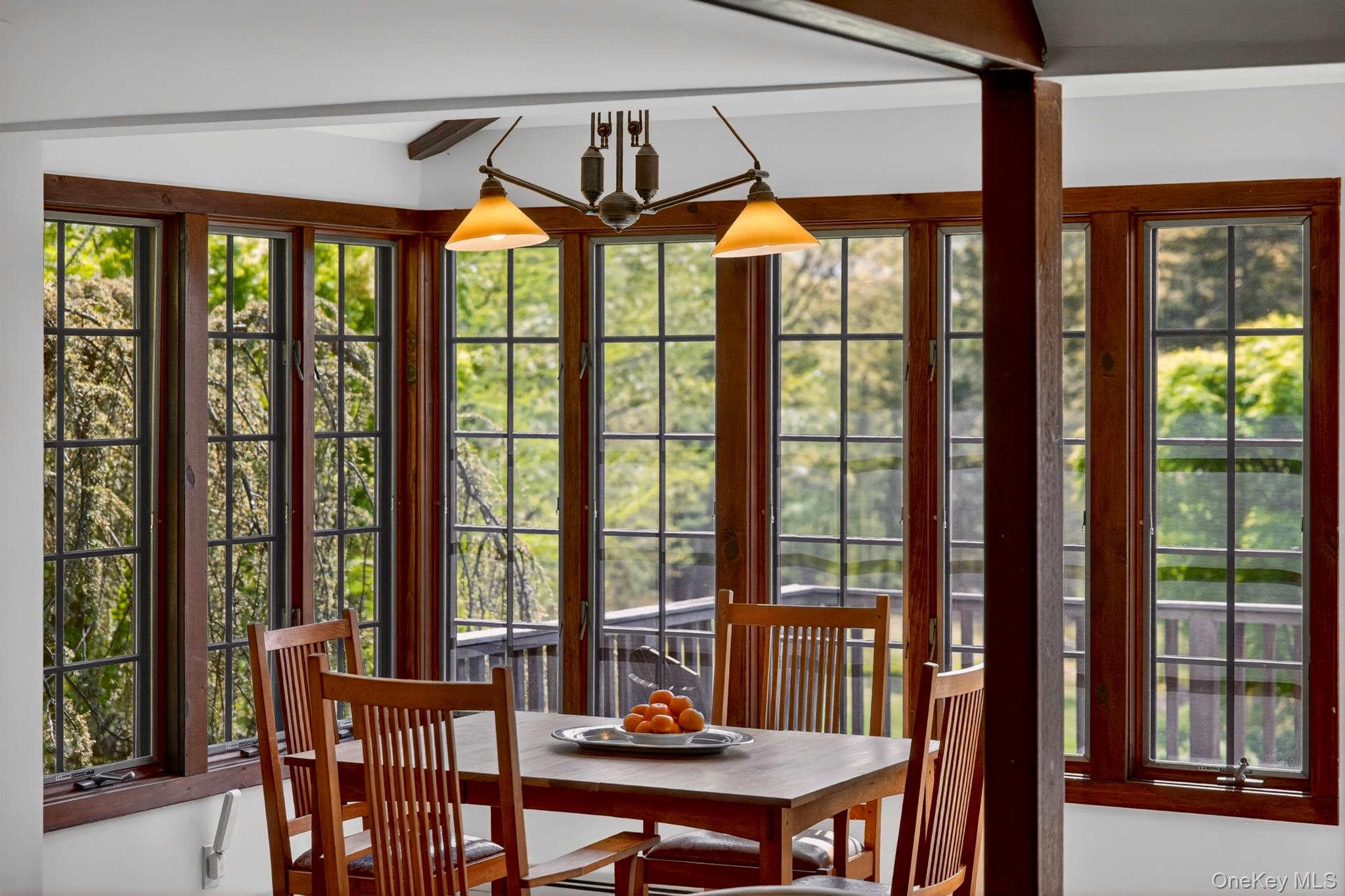 20 Fort Defiance Hill Road Garrison, NY 10524 - Photo 5 of 33 Dining area with access to deck offers sunsets, bluestone flooring
