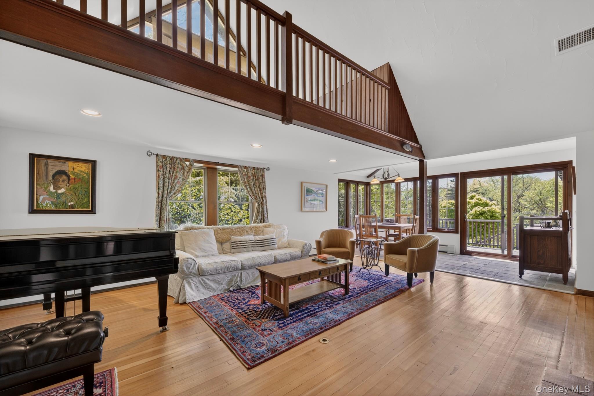 20 Fort Defiance Hill Road Garrison, NY 10524 - Photo 6 of 33 Living room to dining area and porch with western views