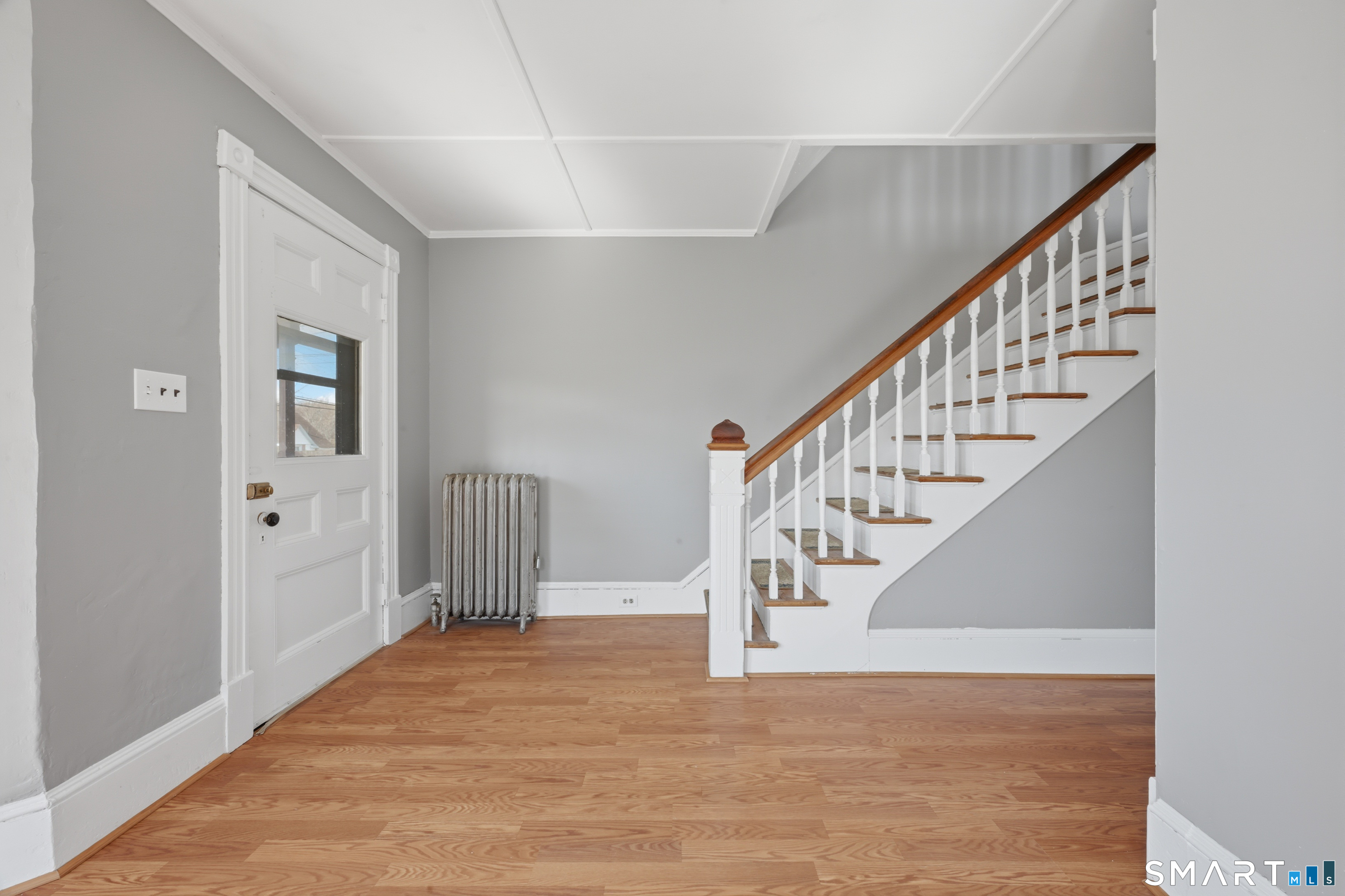 43 Dunham Street Norwich, CT 06360 - Photo 13 of 26 a view of entryway and hall with wooden floor