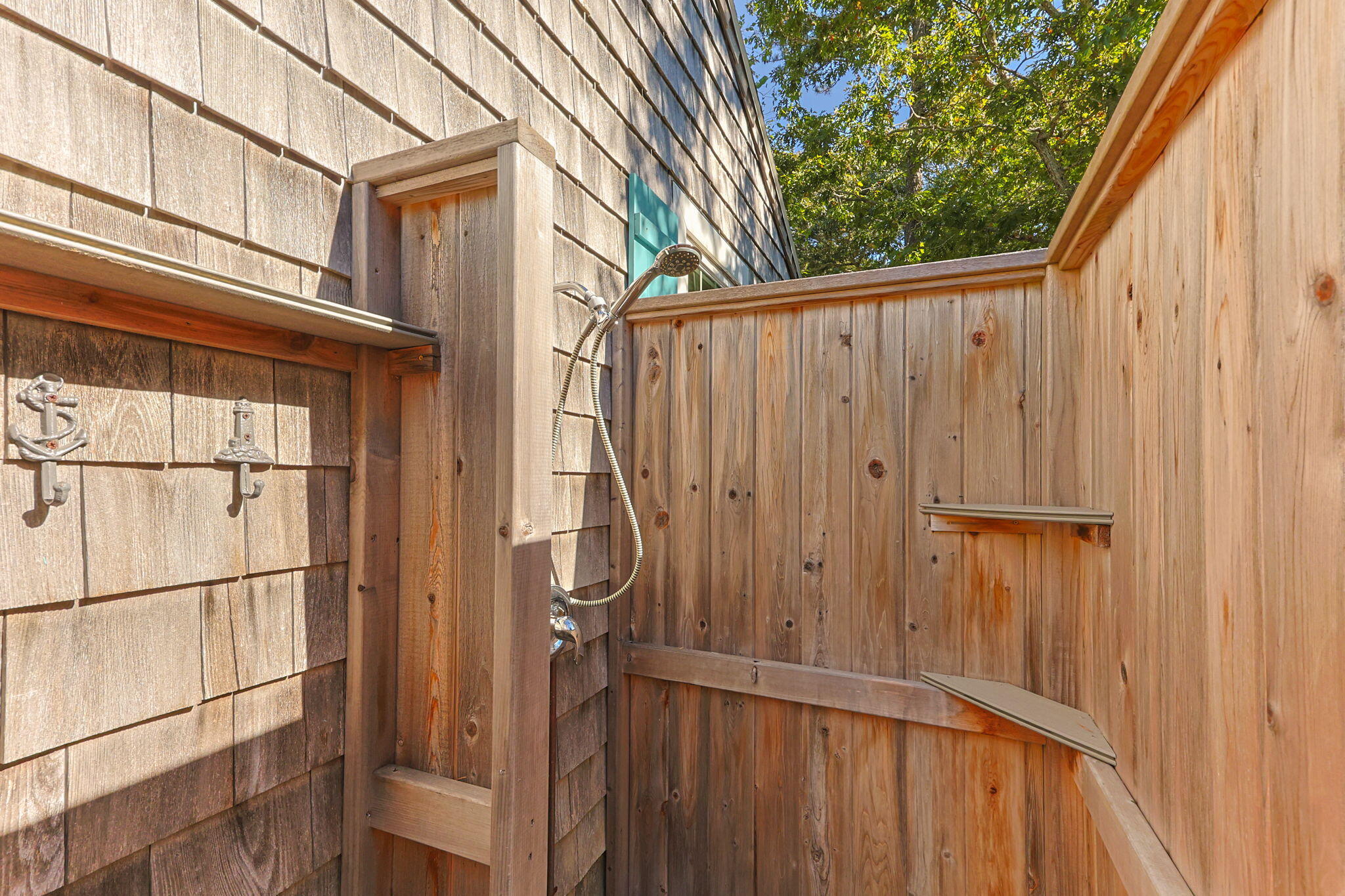 2032 State Hwy Route, Unit F/ (6) Wellfleet, MA 02667 - Photo 23 of 37 a view of a house with a wooden fence