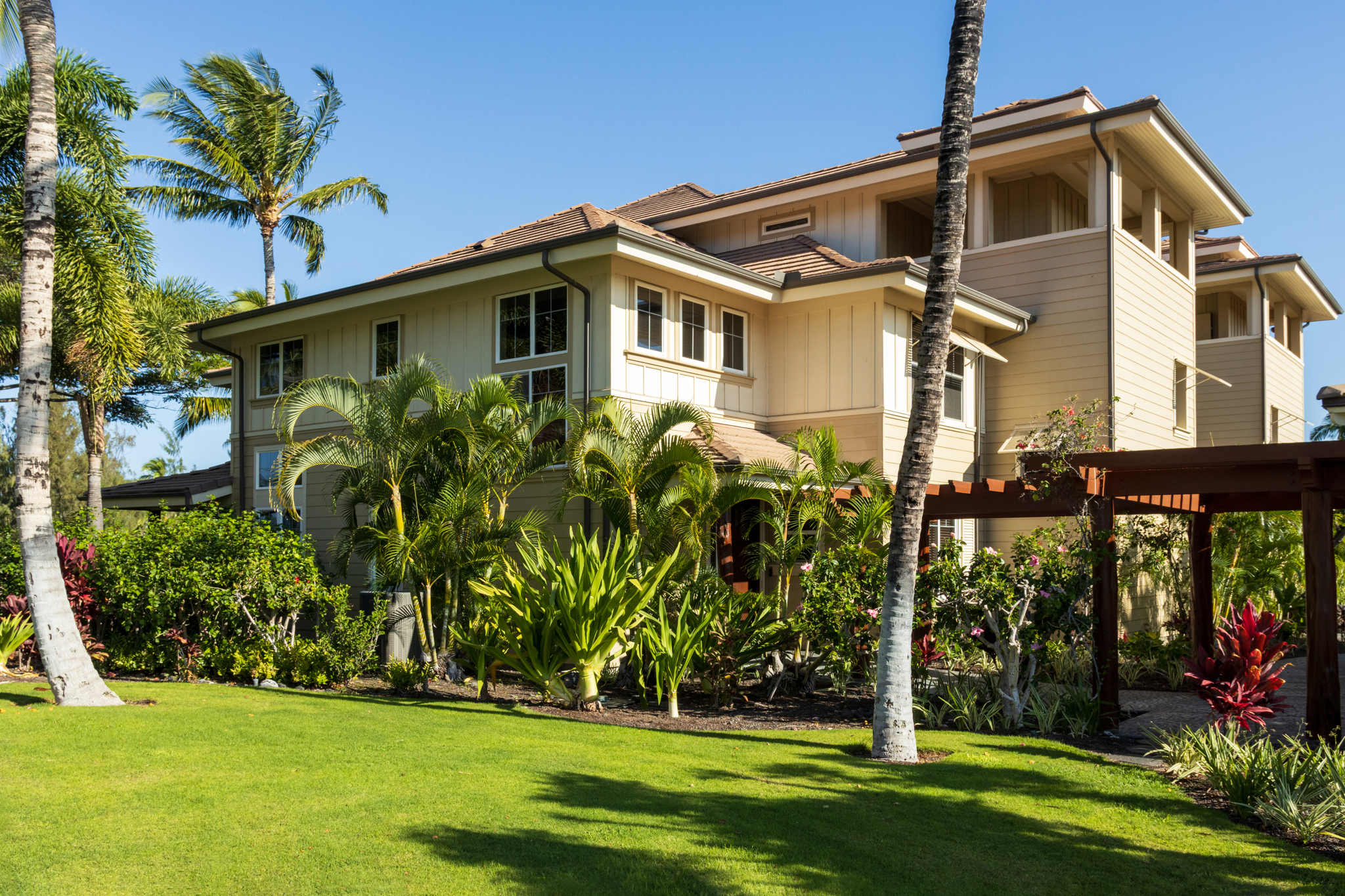 69-180 Waikoloa Beach Drive, Unit O1 Waikoloa, HI 96738 - Photo 1 of 29 a front view of a house with garden