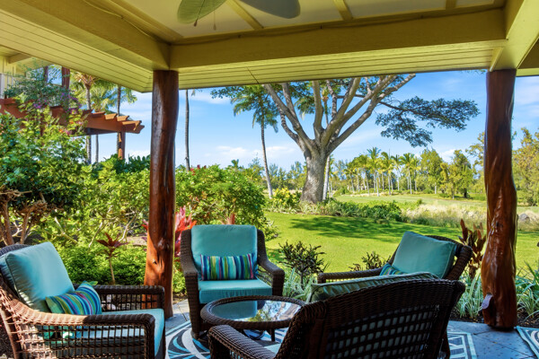 69-180 Waikoloa Beach Drive, Unit O1 Waikoloa, HI 96738 - Photo 11 of 29 a view of a porch with furniture and a yard