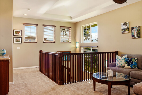 69-180 Waikoloa Beach Drive, Unit O1 Waikoloa, HI 96738 - Photo 13 of 29 a living room with furniture and windows