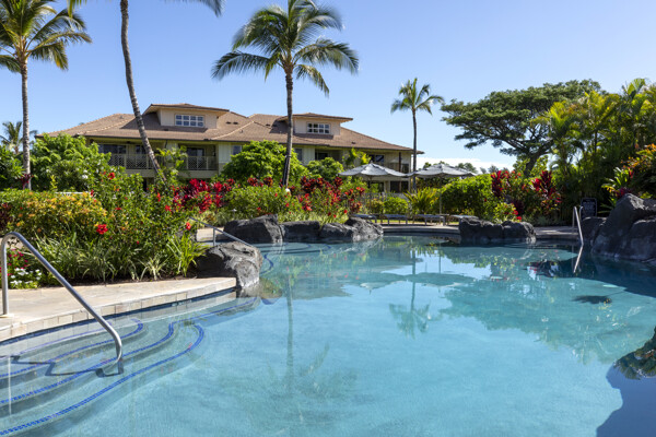 69-180 Waikoloa Beach Drive, Unit O1 Waikoloa, HI 96738 - Photo 25 of 29 a view of a backyard with couches under an umbrella