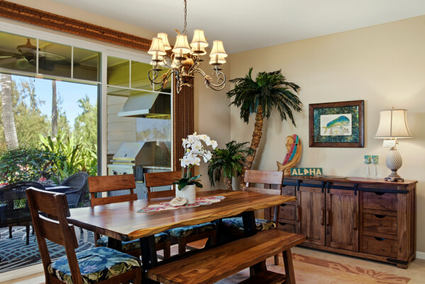 69-180 Waikoloa Beach Drive, Unit O1 Waikoloa, HI 96738 - Photo 8 of 29 a view of a dining room with furniture and chandelier
