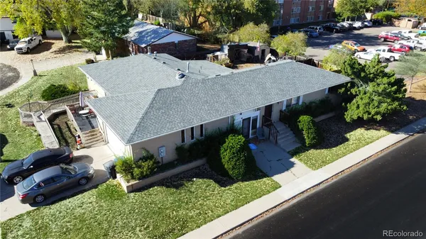 a view of a house with patio and garden
