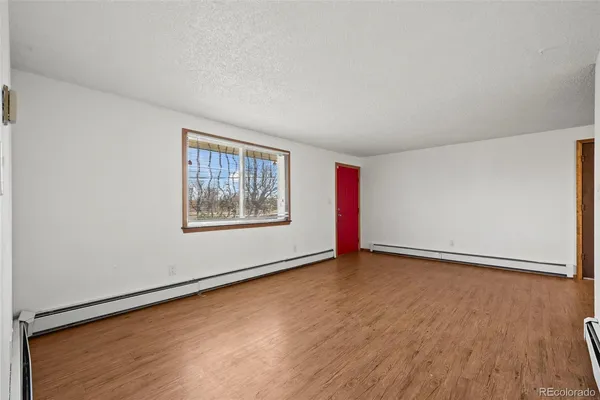 an empty room with window