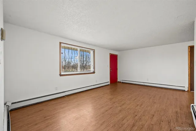 an empty room with window