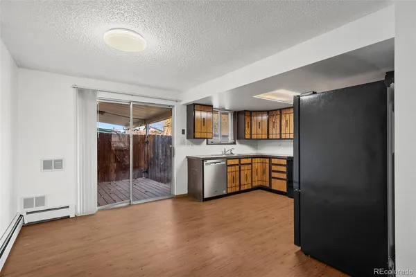 a view of a kitchen with a sink