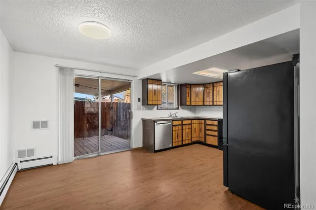 a view of a kitchen with a sink
