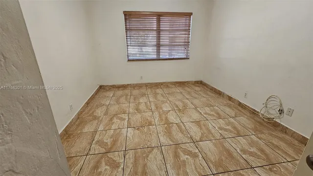 $250,000 | 13715 Kendale Lakes Circle, Unit A201, Miami, FL 33183