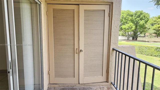 $250,000 | 13715 Kendale Lakes Circle, Unit A201, Miami, FL 33183