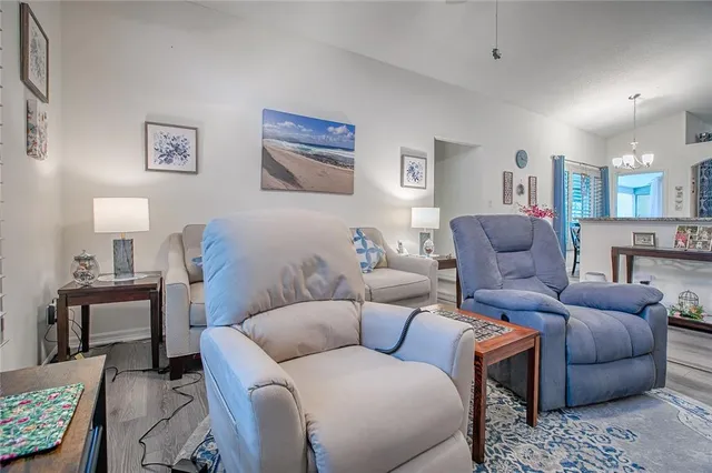 a spacious bathroom with a granite countertop sink toilet and shower