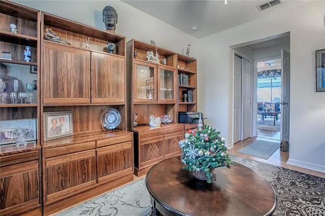 a view of a swimming pool with a patio