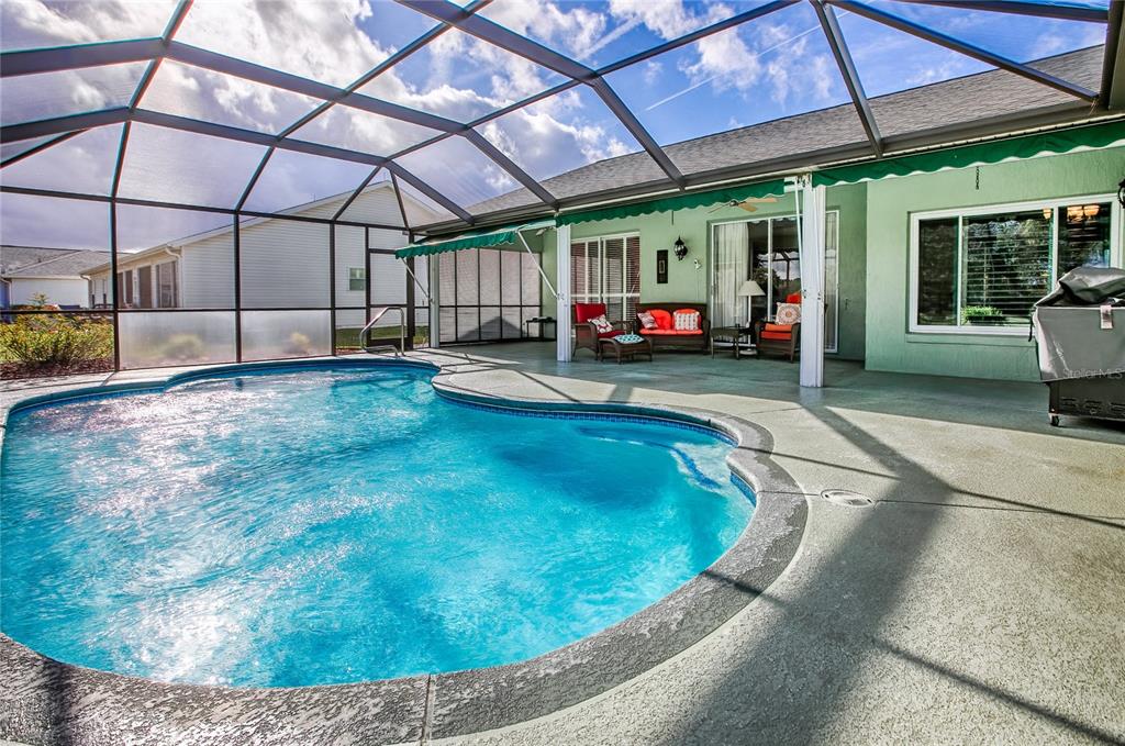 4802 Summerbridge Circle Leesburg, FL 34748 - Photo 38 of 67 a view of a swimming pool with a patio