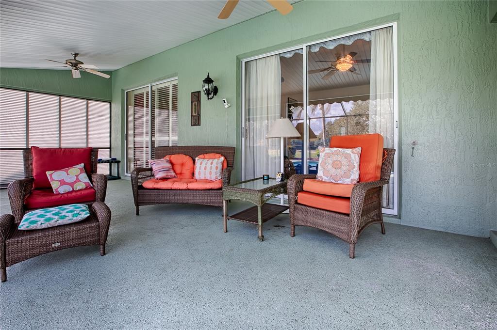 4802 Summerbridge Circle Leesburg, FL 34748 - Photo 43 of 67 a outdoor living space with furniture and a rug