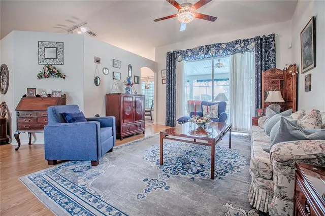 a living room with furniture and a window