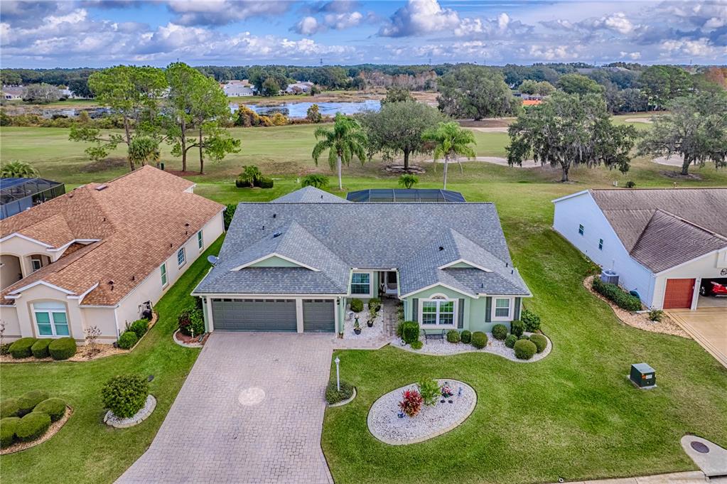 4802 Summerbridge Circle Leesburg, FL 34748 - Photo 52 of 67 an aerial view of a house with outdoor space pool and a large yard