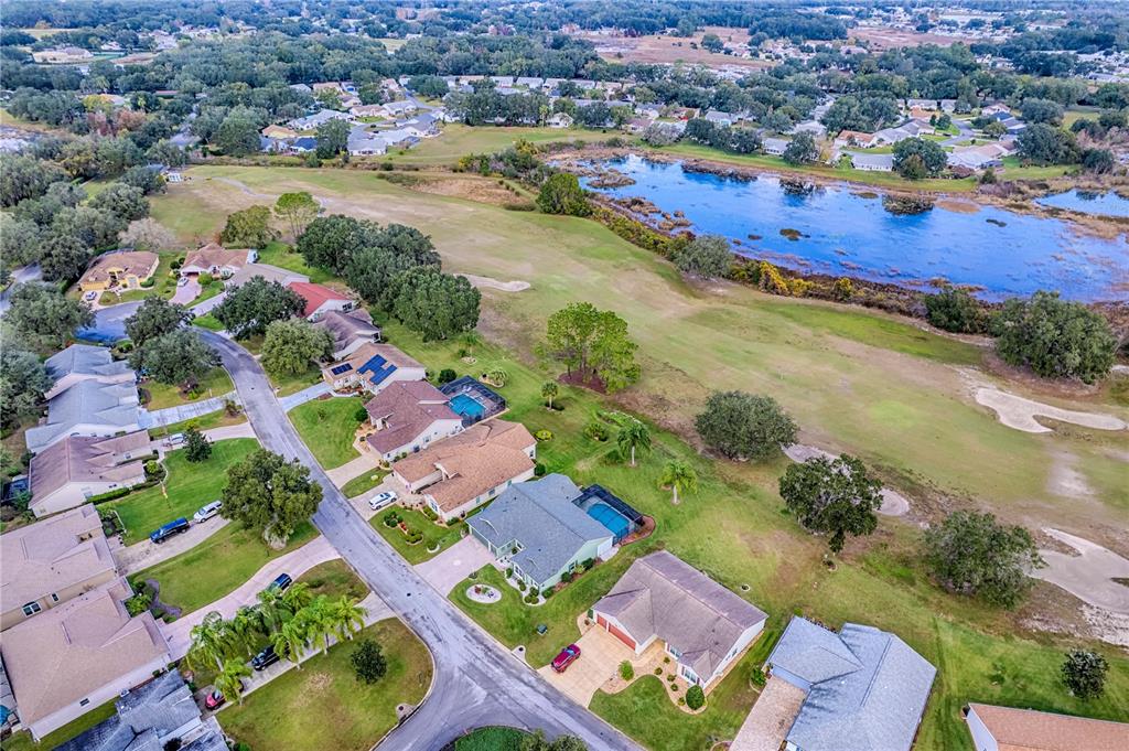 4802 Summerbridge Circle Leesburg, FL 34748 - Photo 61 of 67 an aerial view of residential houses with outdoor space