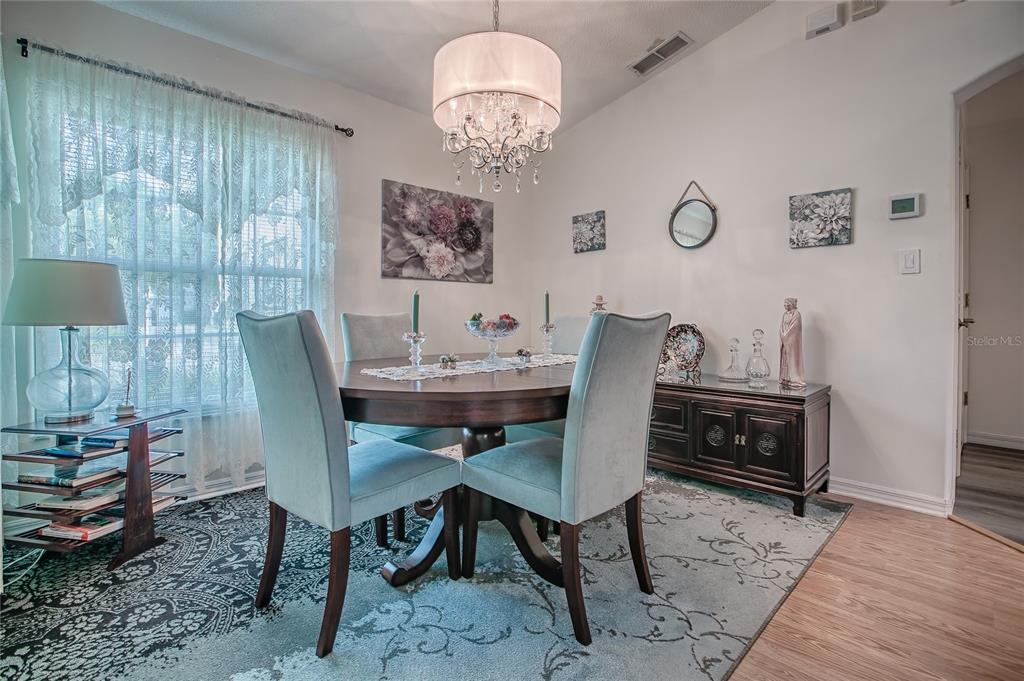 4802 Summerbridge Circle Leesburg, FL 34748 - Photo 9 of 67 a view of a dining room with furniture