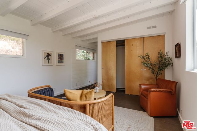 a bathroom with a sink toilet and mirror